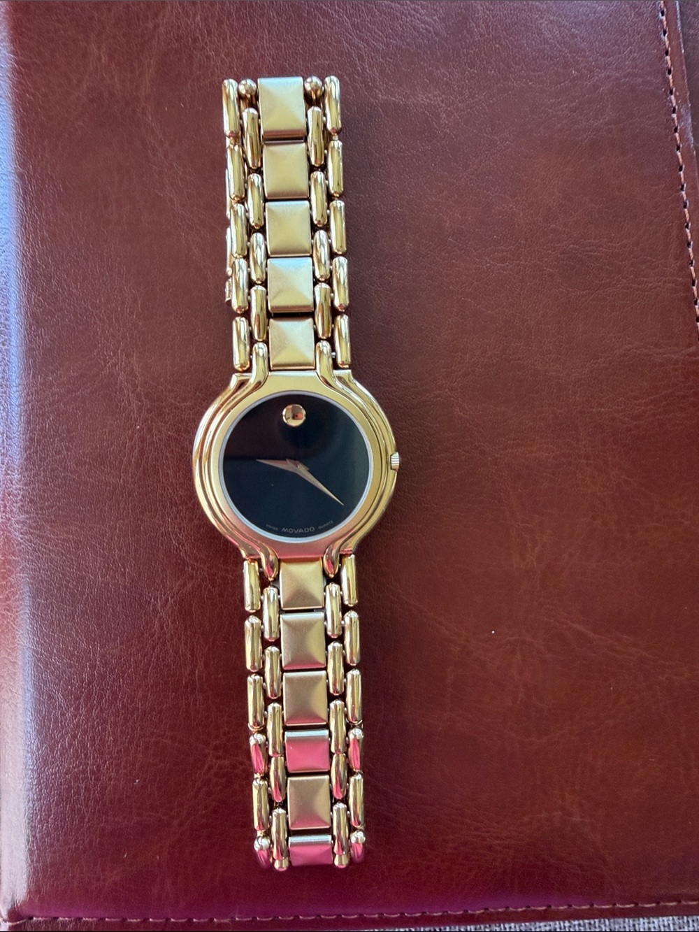 Movado Gold Bracelet with Black Dial